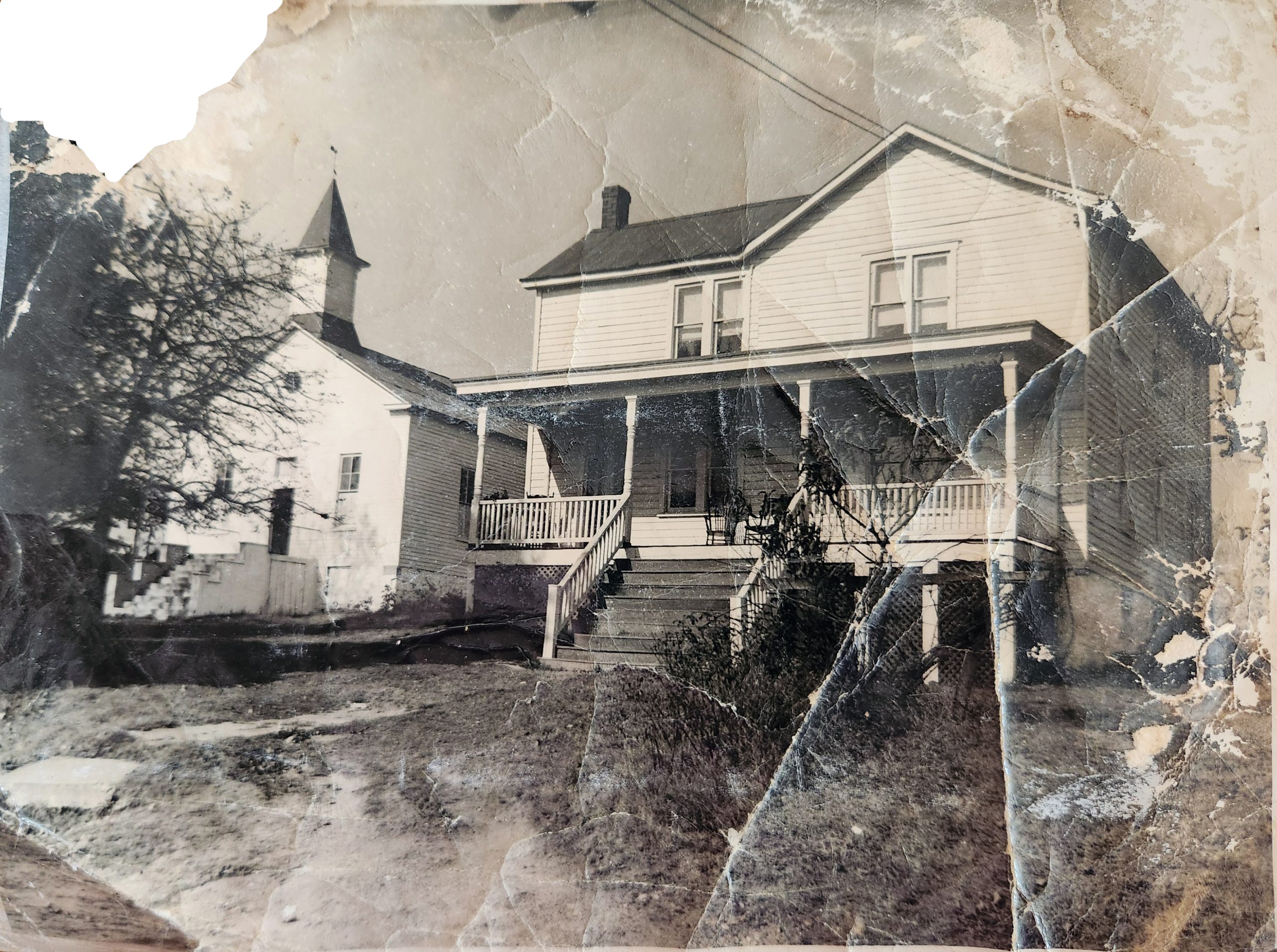 Early photo of John Wesley Church and parsonage