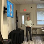 Executive Director Ed Wheeless presents survey results
